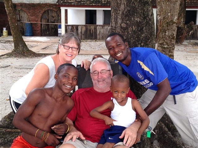 The family relaxing at the beach